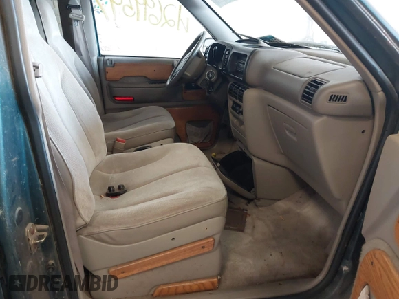 1995 Dodge Caravan Grand SE with VIN 1B4GH44R3SX566801, listed as a IAAI auction lot 42699597 with 103,069 mi miles and . Bid and sale history available at DreamBid. Image 5.