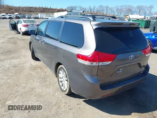 2013 Toyota Sienna XLE with VIN 5TDDK3DC6DS067612, listed as a IAAI auction lot 41756287 with 142,707 mi miles and . Bid and sale history available at DreamBid. Image 3.
