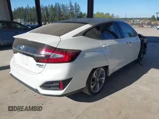 2018 Honda Clarity Plug-In Hybrid Touring with VIN JHMZC5F38JC003207, listed as a IAAI auction lot 42057987 with 35,420 mi miles. Bid and sale history available at carsss.com. Image 4.