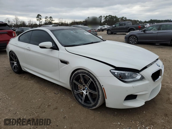 2014 BMW M6 z VIN WBSLX9C51ED160143, wystawiony jako Copart lot #88287015 z przebiegiem 91 717 mil mil oraz Szkoda całkowita • Salvage title. Historia ofert i sprzedaży dostępna na DreamBid. Obrazek 5.