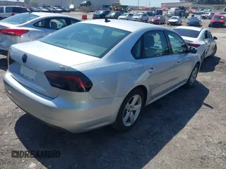 2014 Volkswagen Passat Wolfsburg Edition with VIN 1VWAT7A36EC045573, listed as a IAAI auction lot 41998740 with 151,633 mi miles and . Bid and sale history available at DreamBid. Image 4.