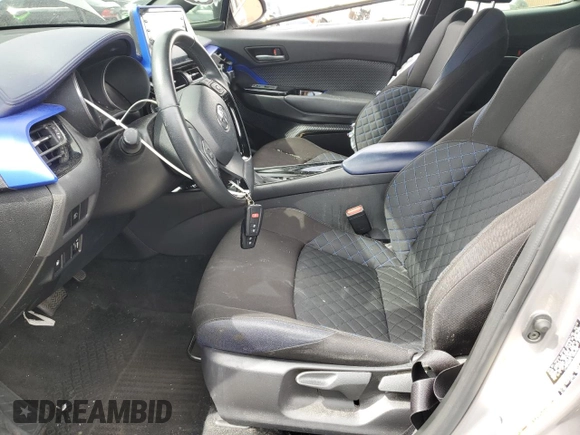 2020 Toyota C-HR LE with VIN JTNKHMBX7L1065098, listed as a Copart auction lot 50101395 with 51,933 mi miles and Salvage Title. Bid and sale history available at DreamBid. Image 7.