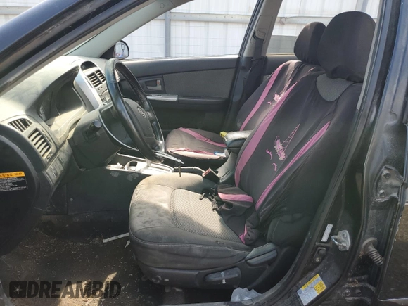 2008 Kia Spectra with VIN KNAFE161885010269, listed as a Copart auction lot 51712965 with 0 mi miles and Salvage Title. Bid and sale history available at carsss.com. Image 7.