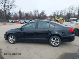 2012 Volkswagen Jetta TDI w/Premium with VIN 3VWLL7AJXCM073394, listed as a IAAI auction lot 41602574 with 159,668 mi miles and . Bid and sale history available at DreamBid. Image 14.