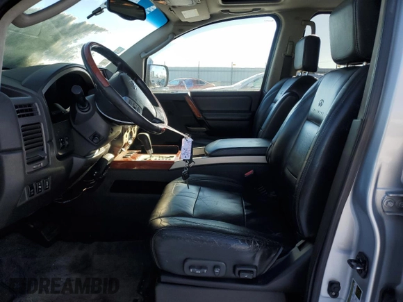 2004 Infiniti QX56 with VIN 5N3AA08C64N811684, listed as a Copart auction lot 87971055 with 214,795 mi miles and Salvage Title. Bid and sale history available at carsss.com. Image 7.