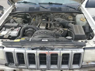 1997 Jeep Grand Cherokee Laredo with VIN 1J4GZ58S2VC676652, listed as a Copart auction lot 64939974 with 256,923 mi miles and Salvage Title. Bid and sale history available at carsss.com. Image 12.
