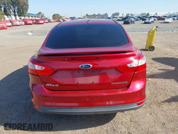 2014 Ford Focus Titanium with VIN 1FADP3J2XEL247827, listed as a IAAI auction lot 41959720 with 105,373 mi miles. Bid and sale history available at carsss.com. Image 16.