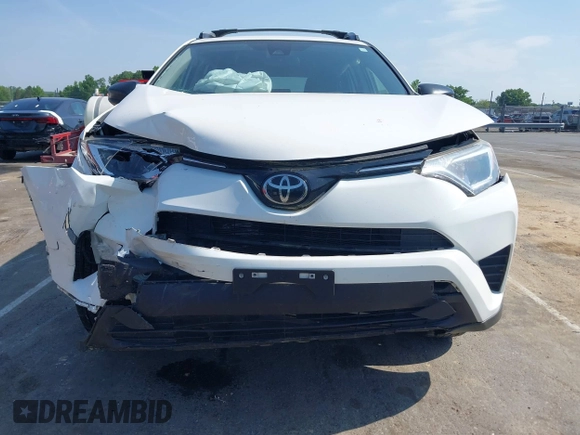 2017 Toyota RAV4 LE with VIN JTMBFREV8HJ157555, listed as a IAAI auction lot 42147300 with 81,187 mi miles and . Bid and sale history available at DreamBid. Image 12.
