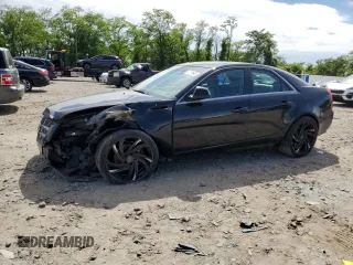 2011 Cadillac CTS with VIN 1G6DA5EY8B0123643, listed as a Copart auction lot 57174545 with 154,046 mi miles and Salvage title. Bid and sale history available at DreamBid. Image 1.