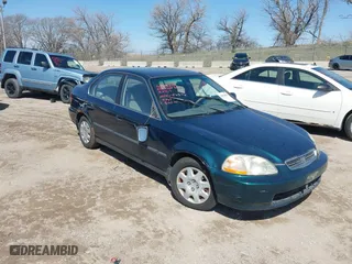 1998 Honda Civic LX with VIN 2HGEJ6670WH545146, listed as a IAAI auction lot 41934019 with 156,378 mi miles. Bid and sale history available at carsss.com. Image 1.