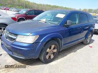 2009 Dodge Journey SXT with VIN 3D4GG57V89T551949, listed as a IAAI auction lot 41874310 with 170,084 mi miles. Bid and sale history available at carsss.com. Image 2.