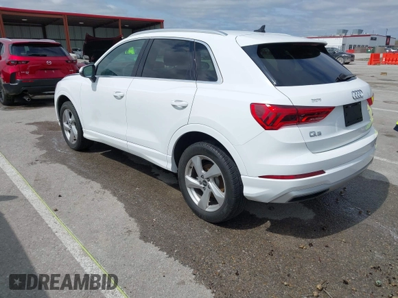 2021 Audi Q3 Premium with VIN WA1AUCF33M1096437, listed as a IAAI auction lot 41910411 with 86,837 mi miles and . Bid and sale history available at DreamBid. Image 3.