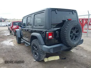 2021 Jeep Wrangler Unlimited Willys with VIN 1C4HJXDN8MW595665, listed as a IAAI auction lot 41507555 with 24,505 mi miles and . Bid and sale history available at DreamBid. Image 3.