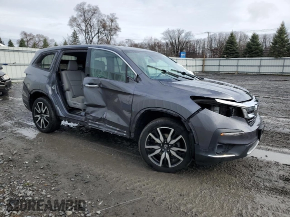 2020 Honda Pilot Touring 7-Passenger with VIN 5FNYF6H60LB039609, listed as a Copart auction lot 51753425 with 57,512 mi miles and Salvage title. Bid and sale history available at DreamBid. Image 4.