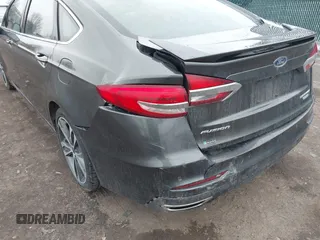 2019 Ford Fusion Titanium with VIN 3FA6P0K9XKR259556, listed as a IAAI auction lot 41823997 with 132,071 mi miles. Bid and sale history available at carsss.com. Image 6.