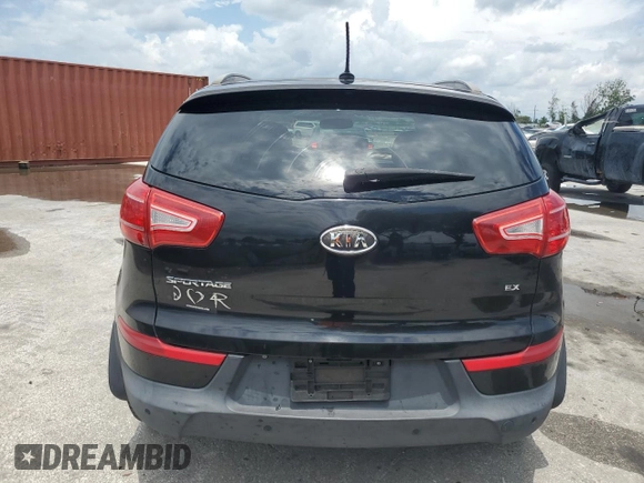 2012 Kia Sportage EX with VIN KNDPC3A21C7303209, listed as a Copart auction lot 58733605 with 189,587 mi miles and Salvage title. Bid and sale history available at DreamBid. Image 6.
