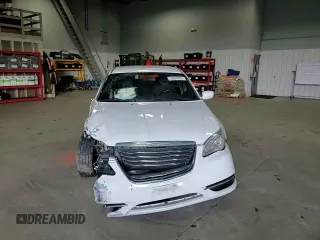 2012 Chrysler 200 Touring with VIN 1C3CCBBB4CN195496, listed as a Copart auction lot 52695825 with 140,821 mi miles and Salvage Title. Bid and sale history available at carsss.com. Image 10.