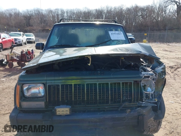 1996 Jeep Cherokee Sport with VIN 1J4FJ68S2TL299150, listed as a IAAI auction lot 41932867 with 142,761 mi miles. Bid and sale history available at carsss.com. Image 12.