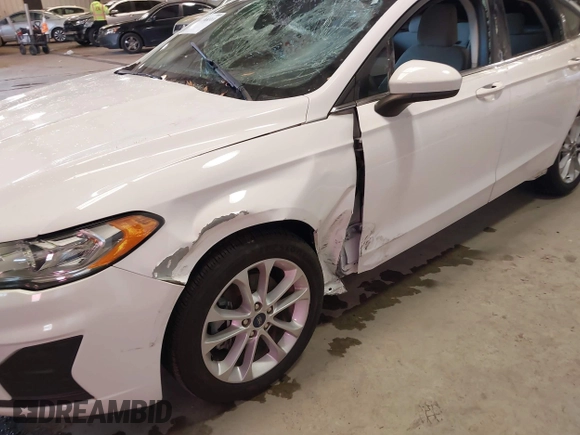 2020 Ford Fusion Hybrid SE with VIN 3FA6P0LU7LR173500, listed as a IAAI auction lot 41368311 with 105,202 mi miles. Bid and sale history available at carsss.com. Image 12.