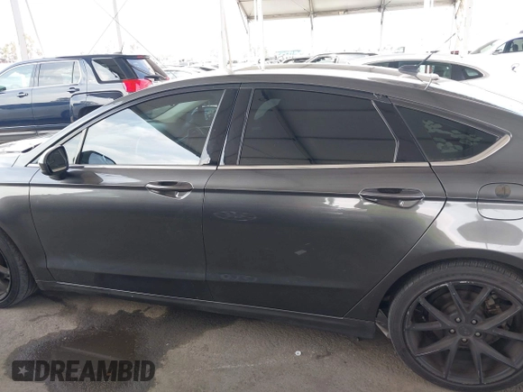2017 Ford Fusion SE with VIN 3FA6P0HDXHR242034, listed as a IAAI auction lot 42356463 with 65,584 mi miles and . Bid and sale history available at DreamBid. Image 15.
