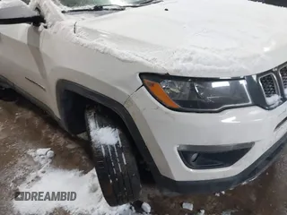 2020 Jeep Compass Latitude with VIN 3C4NJDBB3LT138454, listed as a IAAI auction lot 41614631 with 82,079 mi miles and . Bid and sale history available at DreamBid. Image 6.
