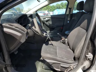 2018 Ford Focus SE z VIN 1FADP3FEXJL256542, wystawiony jako Copart lot #54583915 z przebiegiem 107 774 mil mil oraz Szkoda całkowita • Salvage title. Historia ofert i sprzedaży dostępna na DreamBid. Obrazek 7.