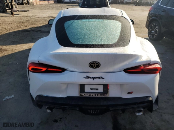 2024 Toyota GR Supra 3.0 with VIN WZ1DB0G07RW068079, listed as a Copart auction lot 83999094 with 387 mi miles and Salvage Title. Bid and sale history available at carsss.com. Image 6.