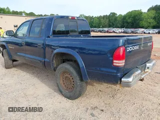 2002 Dodge Dakota SLT z VIN 1B7HG48N82S678086, wystawiony jako IAAI lot #42189540 z przebiegiem Nie podano mil oraz . Historia ofert i sprzedaży dostępna na DreamBid. Obrazek 3.