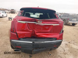 2023 Cadillac XT5 FWD Luxury z VIN 1GYKNAR42PZ147121, wystawiony jako IAAI lot #41315848 z przebiegiem 10 444 mil mil oraz . Historia ofert i sprzedaży dostępna na DreamBid. Obrazek 6.