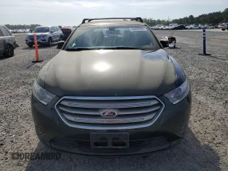 2014 Ford Taurus SEL with VIN 1FAHP2E87EG151866, listed as a Copart auction lot 52692965 with 201,680 mi miles and Clean Title. Bid and sale history available at DreamBid. Image 5.