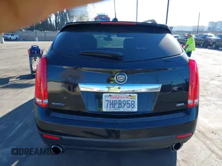 2015 Cadillac SRX z VIN 3GYFNAE32FS543933, wystawiony jako IAAI lot #41578338 z przebiegiem 150 937 mil mil oraz . Historia ofert i sprzedaży dostępna na DreamBid. Obrazek 16.
