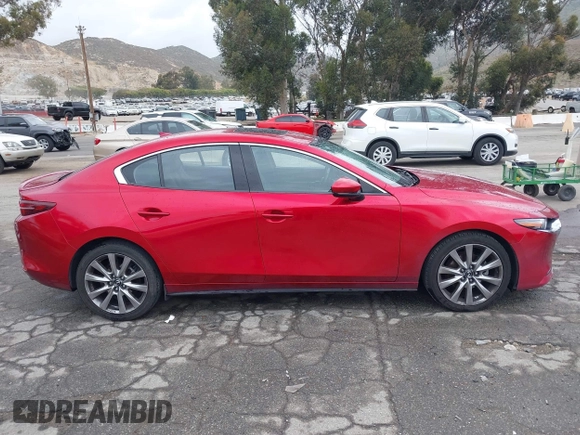2021 Mazda 3 with VIN JM1BPBDL6M1305765, listed as a IAAI auction lot 42063684 with 61,011 mi miles and . Bid and sale history available at DreamBid. Image 13.