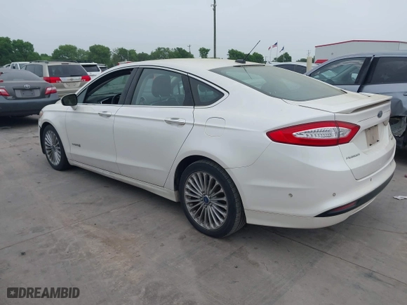 2014 Ford Fusion Titanium Hybrid with VIN 3FA6P0RU6ER115985, listed as a IAAI auction lot 41870494 with 132,321 mi miles. Bid and sale history available at carsss.com. Image 3.