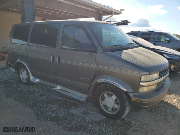 1999 Chevrolet Astro Cargo Van YF7 with VIN 1GBDM19W2XB174951, listed as a Copart auction lot 76009344 with 131,554 mi miles and Salvage Title. Bid and sale history available at carsss.com. Image 4.
