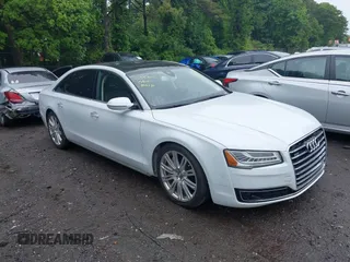 2015 Audi A8 4.0T z VIN WAU32AFD5FN008739, wystawiony jako IAAI lot #42387612 z przebiegiem 94 893 mil mil oraz . Historia ofert i sprzedaży dostępna na DreamBid. Obrazek 1.