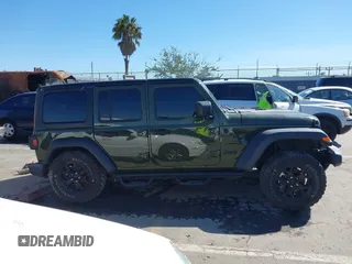 2022 Jeep Wrangler Unlimited Sport with VIN 1C4HJXDG5NW113205, listed as a IAAI auction lot 41836171 with 30,446 mi miles and . Bid and sale history available at DreamBid. Image 14.