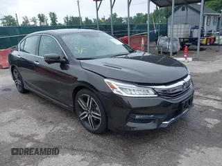 2017 Honda Accord Touring with VIN 1HGCR3F91HA039309, listed as a IAAI auction lot 42522155 with 53,789 mi miles and . Bid and sale history available at DreamBid. Image 1.