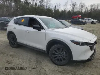 2024 Mazda CX-5 2.5 Carbon Turbo with VIN JM3KFBAY7R0405607, listed as a Copart auction lot 42331165 with 9,207 mi miles and Salvage Title. Bid and sale history available at carsss.com. Image 4.