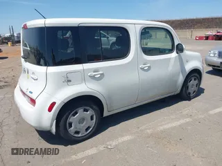 2013 Nissan Cube SL z VIN JN8AZ2KR5DT300935, wystawiony jako IAAI lot #42404264 z przebiegiem 119 808 mil mil oraz . Historia ofert i sprzedaży dostępna na DreamBid. Obrazek 4.