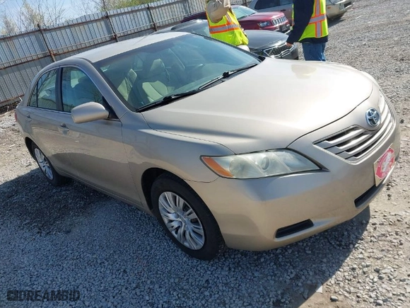 2007 Toyota Camry CE with VIN 4T1BE46K57U082347, listed as a IAAI auction lot 42004676 with 107,000 mi miles. Bid and sale history available at carsss.com. Image 1.