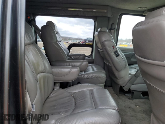 2003 GMC Savana z VIN 1GDGG29U031206019, wystawiony jako Copart lot #48920054 z przebiegiem Nie podano mil oraz Szkoda całkowita • Salvage title. Historia ofert i sprzedaży dostępna na DreamBid. Obrazek 11.