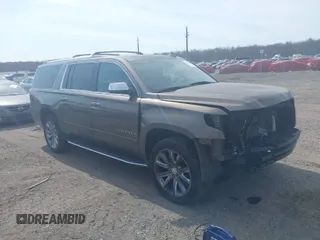 2016 Chevrolet Suburban LTZ with VIN 1GNSKJKC9GR255307, listed as a IAAI auction lot 41785233 with 202,101 mi miles. Bid and sale history available at carsss.com. Image 1.