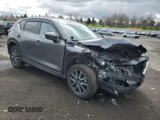 2018 Mazda CX-5 Touring with VIN JM3KFBCM1J0372702, listed as a Copart auction lot 49714595 with 107,805 mi miles and Salvage Title. Bid and sale history available at carsss.com. Image 4.