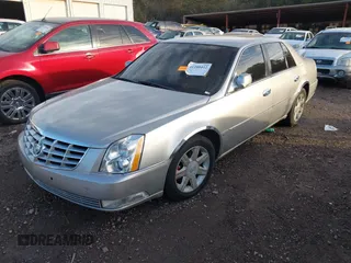 2006 Cadillac DTS 1SC z VIN 1G6KD57Y26U104838, wystawiony jako IAAI lot #41280412 z przebiegiem 172 494 mil mil oraz . Historia ofert i sprzedaży dostępna na DreamBid. Obrazek 2.