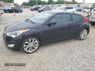 2012 Hyundai Veloster w/Black Int z VIN KMHTC6AD9CU064829, wystawiony jako Copart lot #61193885 z przebiegiem 136 160 mil mil oraz Czysty tytuł • Clean title. Historia ofert i sprzedaży dostępna na DreamBid. Obrazek 1.