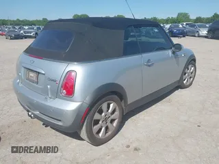 2006 MINI Convertible S with VIN WMWRH33596TK59633, listed as a IAAI auction lot 42242545 with 77,837 mi miles and . Bid and sale history available at DreamBid. Image 4.