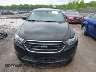 2015 Ford Taurus SEL z VIN 1FAHP2E86FG172631, wystawiony jako IAAI lot #42307630 z przebiegiem 95 184 mil mil oraz . Historia ofert i sprzedaży dostępna na DreamBid. Obrazek 13.