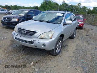 2007 Lexus RX 400h with VIN JTJGW31U672001021, listed as a IAAI auction lot 42209431 with 245,653 mi miles and . Bid and sale history available at DreamBid. Image 2.