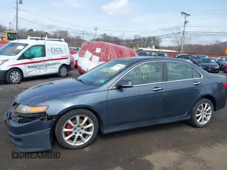 2006 Acura TSX z VIN JH4CL96826C034551, wystawiony jako IAAI lot #41880169 z przebiegiem 202 149 mil mil oraz . Historia ofert i sprzedaży dostępna na DreamBid. Obrazek 13.