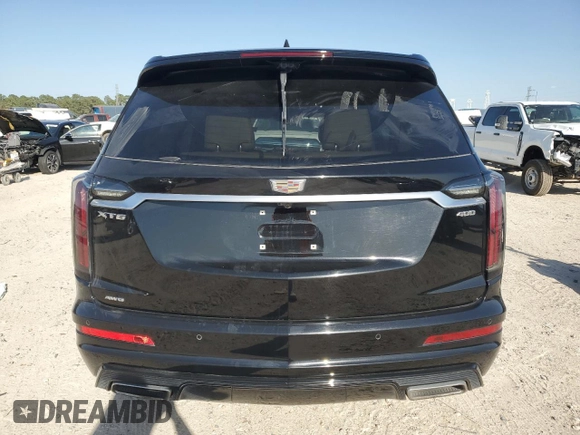 2020 Cadillac XT6 AWD Sport z VIN 1GYKPHRS2LZ172371, wystawiony jako Copart lot #50211705 z przebiegiem 59 704 mil mil oraz Szkody całkowita. Historia ofert i sprzedaży dostępna na DreamBid. Obrazek 6.